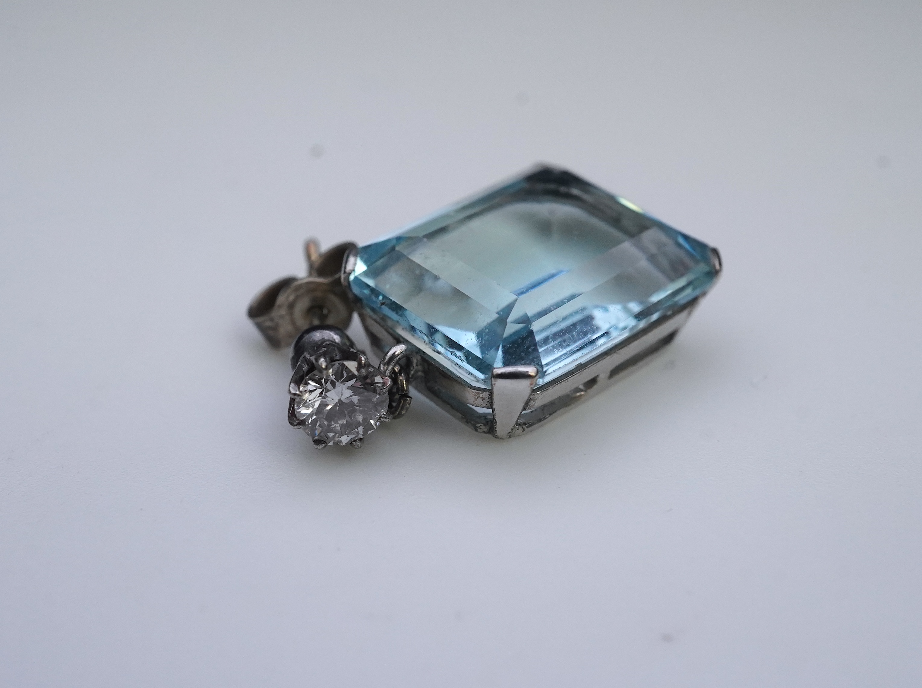 A pair of aquamarine and diamond earrings